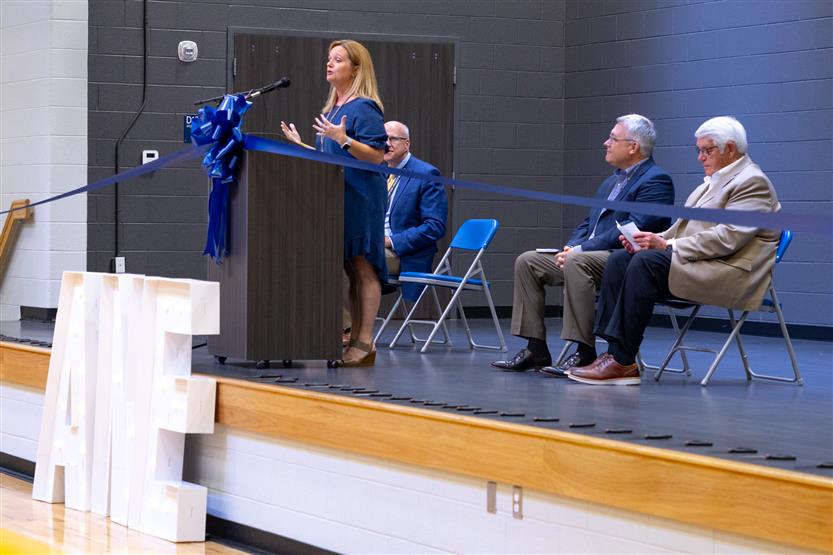 Students cut ribbon at new school